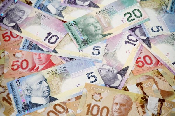 16615862-Big-pile-of-money-Canadian-dollars-Stock-Photo-canada